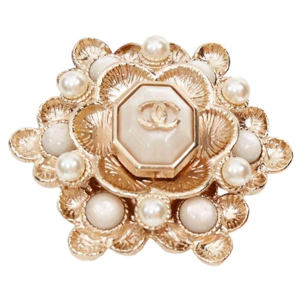Chanel gold tone CC faux pearl medallion brooch